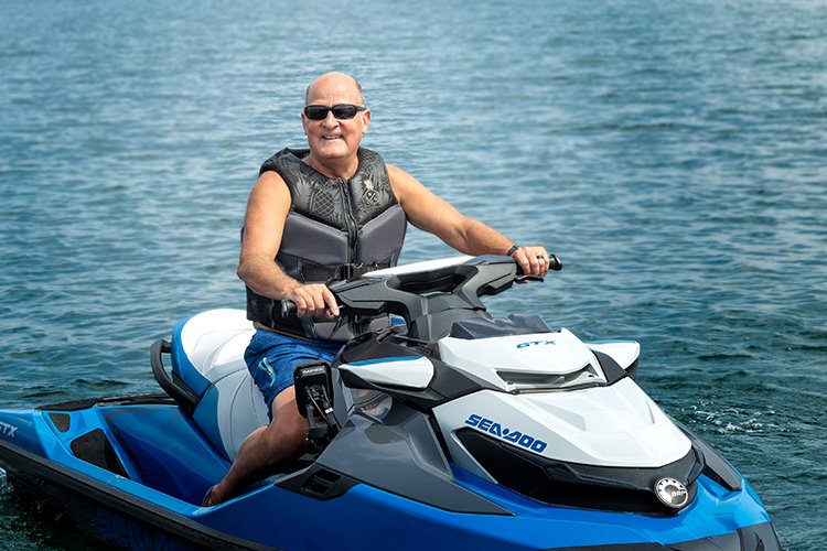 Photo of Clare Trischler on a jet ski.