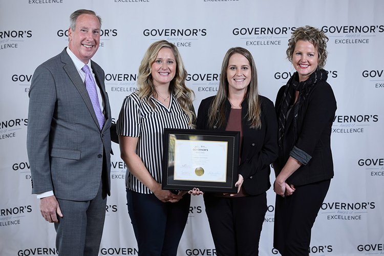 Photo of the Midland Quality Team accepting an award