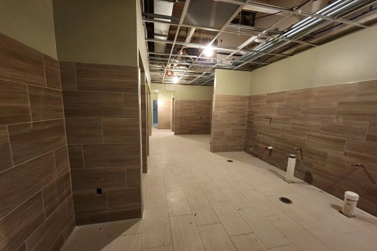 Tile and flooring completed in the staff locker room.