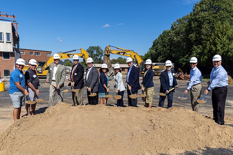 Photo of Foundation and board members holding shovels of dirt at the Alma Surgical Services Groundbreaking event.