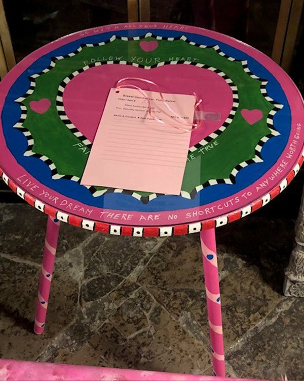 Photo of pink painted chair or stool for the auction