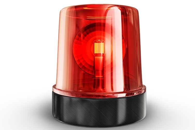 Photo of a red siren light.