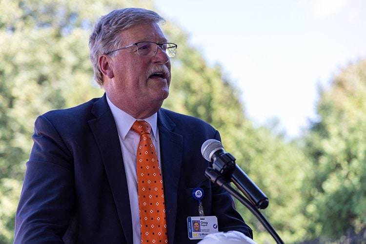 Photo of Greg Rogers addressing the crowd at the Alma Surgical Services Groundbreaking event.