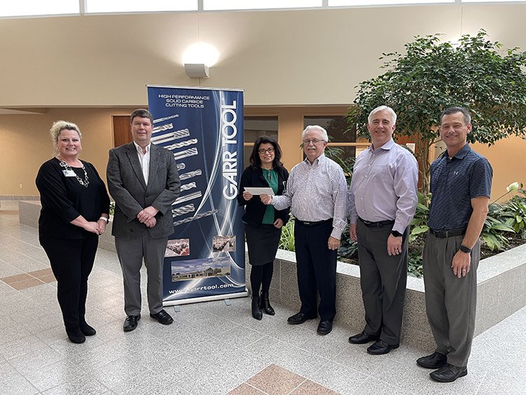 Photo of Garr Tool representatives presenting a donation of $250,000 to MyMichigan Health.